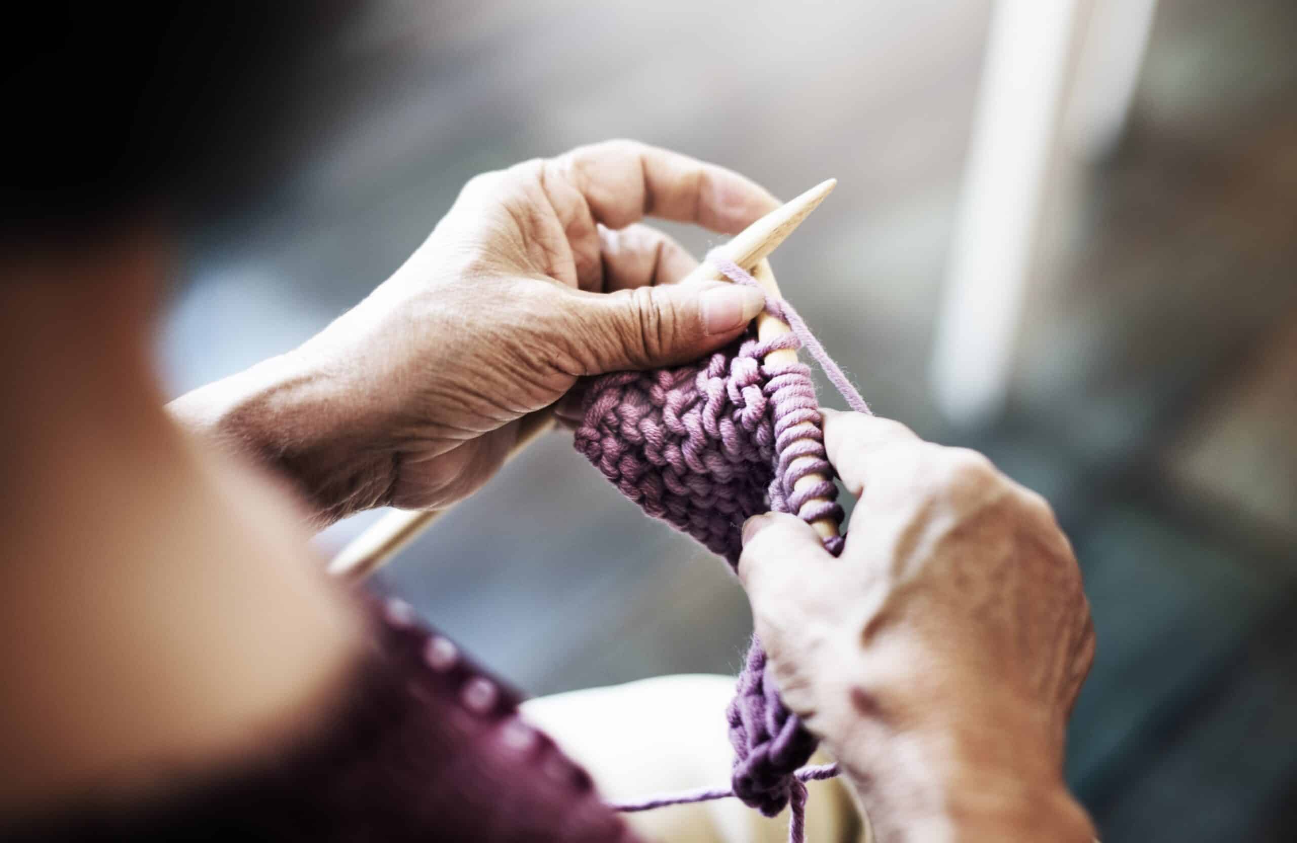 Close-up of senior crocheting