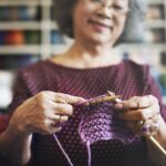 close-up of senior woman knitting